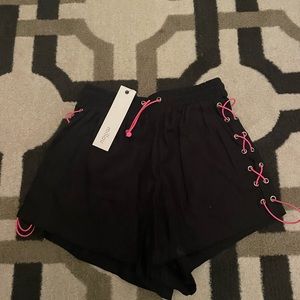 Brand new Millau from LF black shorts with hot pink detail S retail $120